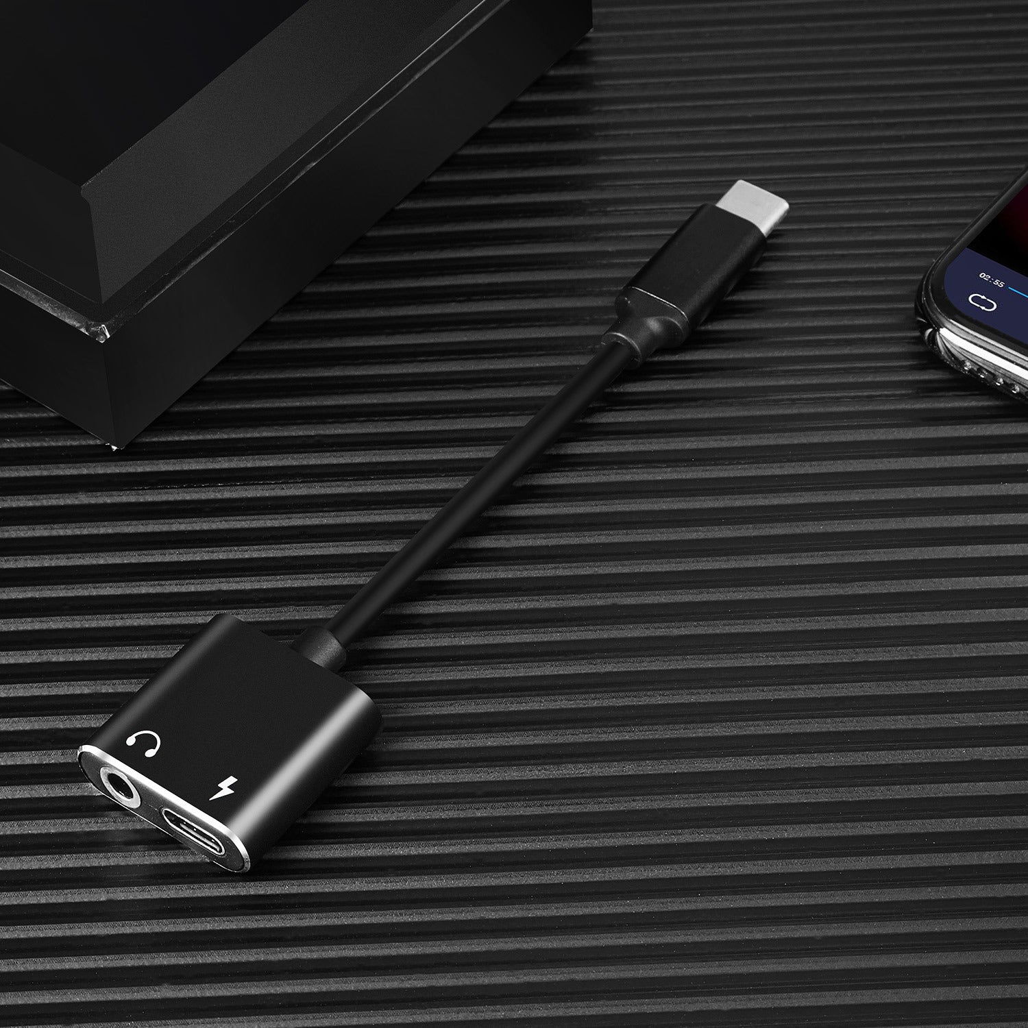 Mobile phone adapter to listen to songs two in one