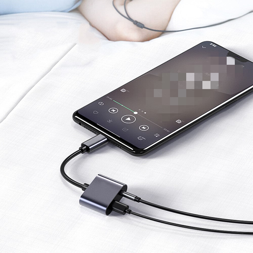 Mobile phone adapter to listen to songs two in one